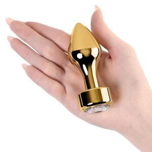Gold anal plug TOYFA Metal with white round-shaped gem , length 7 cm, diameter 2-3,5 cm, weight 140 gr